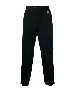 Wide-leg logo-charm trousers